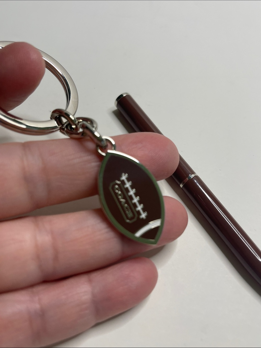 Coach Brown Enamel Football Keychain with Silver Hardware and Coach Pen - Picture 4 of 6
